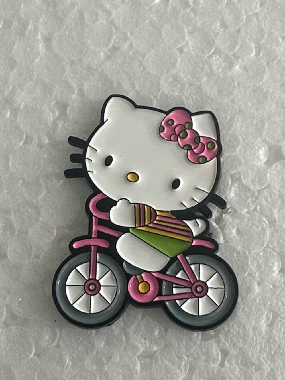 Hello Kitty Pink Bicycle Pin with Multicolor Stripes